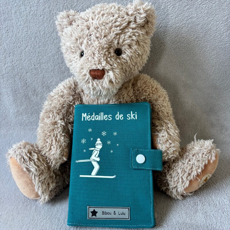 Livret médailles de ski - Garçon ou Fille - Bleu turquoise